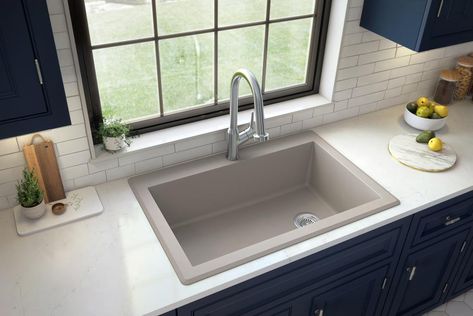 Designed for installation as a top mount sink in any countertop material. Made from 80% natural quartz crystals and pure acrylic resin. Heat resistant up to 535°F and can withstand rapid temperature changes from cold and hot water. Overall sink length (side to side): 33 in. Overall sink width (front to back): 22 in. Inside bowl dimensions: 29 in x 16-3/8 in x 9 in. Minimum cabinet size required: 33 in sink base cabinet. Drain opening size: 3-1/2 in. Karran Drop-In 33-in x 22-in Concrete Single B Composite Kitchen Sinks, Quartz Sink, Drop In Kitchen Sink, Grey Quartz, Solid Surface Countertops, Countertop Material, Sink Grid, Double Bowl Kitchen Sink, Quartz Kitchen