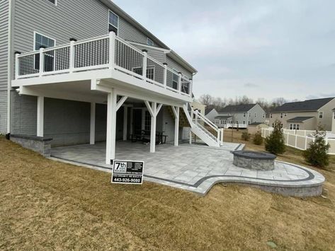 High Back Porch Ideas, Deck Over Walkout Basement Patio, Walkout Backyard Ideas, Backyard Patio Designs Under Deck, Stamped Concrete Patio Under Deck, Paver Patio Under Deck, Patio Under Deck Walkout Basement, Deck Down To Patio, Walkout Basement Patio Ideas Under Decks