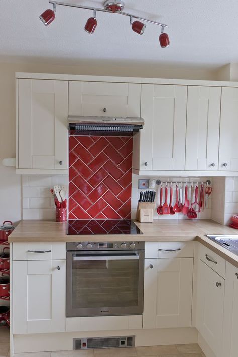 Green Kitchen Red Accents, Red Theme Kitchen, Red Tile Kitchen Backsplash, Red Tiled Kitchen, Red Kitchen Backsplash, Red Themed Kitchen, White Kitchen Red Accents, Kitchen Red Backsplash, White Kitchen With Red Accents