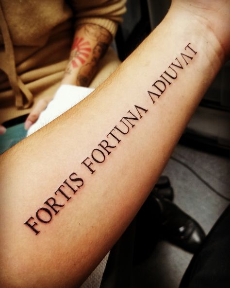 My first tattoo. Fortune favors the bold. Bold Font Tattoo Words, Latin Font Tattoo, Bold Tattoo Fonts For Men, Fortis Fortuna Adiuvat Tattoo Font, Roman Quotes Tattoos, Men’s First Tattoo, Fortis Fortuna Adiuvat Tattoo Arm, Audaces Fortuna Iuvat Tattoo, Fortis Fortuna Adiuvat Tattoo Design