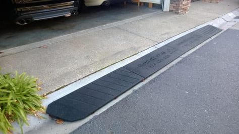 We Review the Best Curb Ramps for Driveways & Garage Floors | All Garage Floors Garage Ramp Ideas, Garage Ramp Entrance, Curb Ramp Driveway Diy, Driveway Curb Ramp, Wheelchair Ramp In Garage, Car Parking Ramp Slope, Diy Ledge, Driveway Ramp, Rubber Ramp