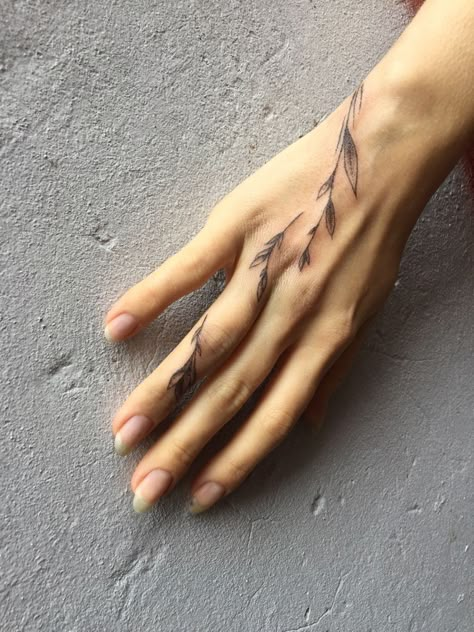 Finger Tattoos For Women Leaves, Hand Tattoos For Women Leaves, Fine Line Back Tattoos For Women, Hand Tattoos Minimalist, Minimalist Hand Tattoos For Women, Vine Forearm Tattoo, Tattoo Spine, Wrap Around Wrist Tattoos, Cuff Tattoo