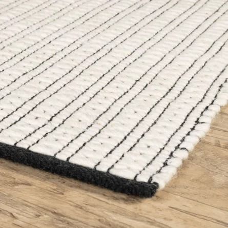 Home Conservatory Ribbon Ivory/Black Handwoven Wool Rug | Wayfair Black And Cream Area Rug Living Room, Black And Cream Area Rug, White And Black Area Rug, White Rug Bedroom, Black White And Grey Bedroom, Home Conservatory, Simple Rug, Black Nursery, Flatweave Rugs