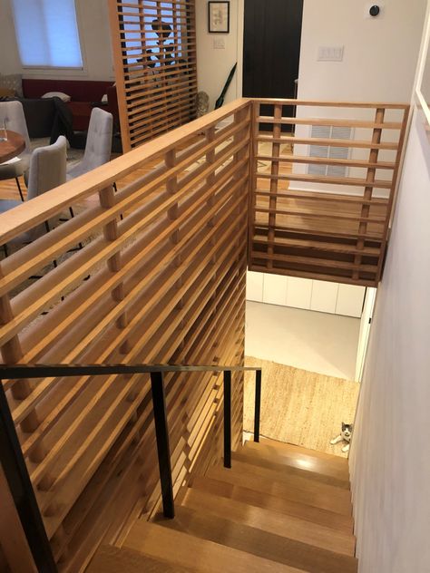 Rift-Sawn oak stairs and slat walls for a beautiful home in Barrington IL Half Wall Railing Stairs, Wood Slat Railing, Slat Staircase, Slat Railing, Loft Suite, Stairwell Ideas, Diy Stair Railing, Stairs Makeover Ideas, Loft Railing