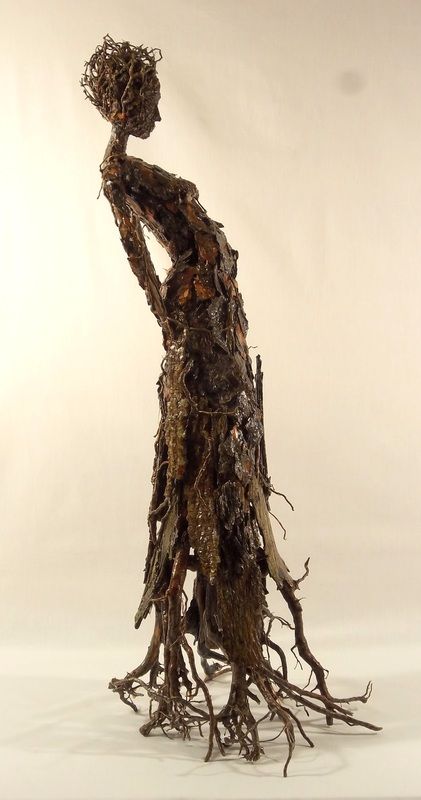 sculpture by Becky Grismer Art.  Roots is part of the series of tree bark figures that are meant to represent some of the individual characteristics shared by trees and humans. Roots represents the common characteristic of both trees and humans having roots. Pine tree roots create the figure's base, head piece and are found in the body detail. Boom Kunst, Tree Roots, Wow Art, Ancient Aliens, 판타지 아트, Sculpture Installation, Figurative Sculpture, Land Art, Human Figure