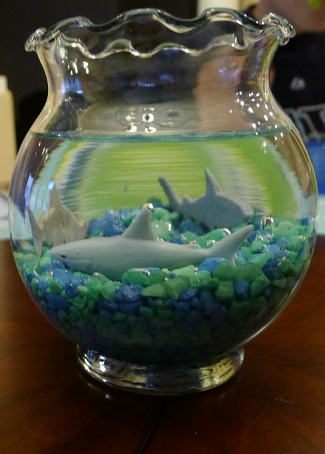 Shark center piece for PJ's 7th Birthday Shark Birthday Party Centerpieces, Shark Table Centerpiece, Shark Birthday Centerpieces, Shark Party Centerpiece Ideas, Shark Centerpiece Ideas, Shark Centerpieces, Shark Birthday Decorations, Baby Shower Ideas For Boys Themes, Sharknado Party