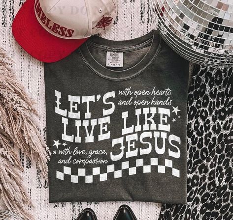 **Sunday Vibes | All About Jesus 🙏** It’s Sunday, so you know it’s all about faith, love, and Jesus! ✨ Rock your favorite **Faith Tee** today and let His light shine through you. 🌟 Wear your faith proudly. 🙌 #SundayBlessings #FaithTee #JesusFirst #SundayStyle Girly Shirts, Western Tees, Mom Fits, Shop Small Business Quotes, Graphic Shirt Design, Cricket Ideas, Fun Shirts, Western Tee, Sunday Style