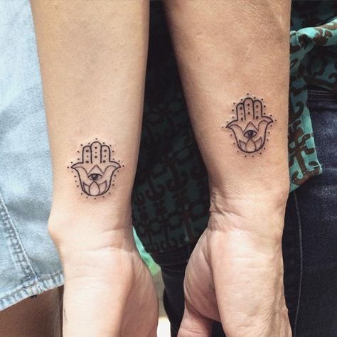 hamsa hand tattoo for couples Fatima Hand Tattoo, Eye Tattoo Meaning, Hamsa Hand Tattoo, Evil Eye Tattoo, Yoga Tattoos, Hamsa Tattoo, Small Wrist Tattoos, Eye Tattoo, Hand Tattoo