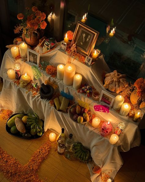 A warm, inviting Day of the Dead altar adorned with candles, flowers, and offerings—honoring loved ones with a beautiful blend of tradition and love. Day Of The Dead Altar, Honoring Loved Ones, Traditional Day, Candles Flowers, Day Of Dead, Cozy Day, Candle Glow, Day Of The Dead, Loved Ones