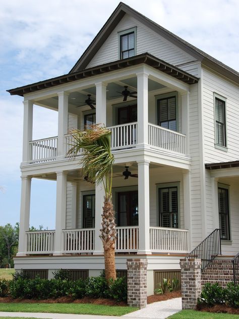 They are all Sherwin Williams Colors- The eaves are Prioleau's Wharf, the siding is Aunt Betty's China and the trim around the windows is Willow Tree”   This is a nice cottage for our Carolina property. Estilo Charleston, Split Foyer, Charleston Style, Wood Columns, Coastal Bedrooms, Traditional Exterior, Beach Cottage Decor, House With Porch, Beach Cottage Style