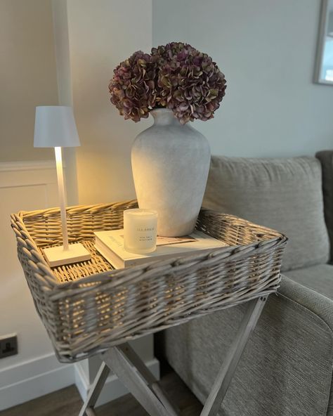 Neutral wicker butler tray 😍 Currently on promotion. Limited stock available. #butlertray #neutraldecor #neutrallivingroom #livingspaceinspo #sidetabledecor #sidetables Wicker Tray Decor, Burgundy Hydrangea, Butlers Tray Table, Living Room Panelling, Cosy Decor, Neutral Cushions, Butler Tray, Side Table Decor, Stone Vase