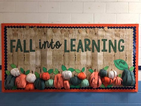 Fall into Learning October bulletin board! Students used nouns and adjectives to describe all things fall on strips of paper before they were assembled to create 3D pumpkins! How To Make 3d Pumpkin Bulletin Board, 3d Pumpkins For Bulletin Boards, Fall Bulletin Board Ideas Elementary, Fall Decor For Classroom Bulletin Boards, 3d Pumpkin Bulletin Board, Elementary Fall Bulletin Boards, Student Art Display Bulletin Boards, October Math Bulletin Boards, Fall Pto Bulletin Board Ideas