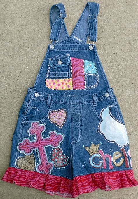 Painted overalls for your child with this design of cheetah hearts and zebra crosses and sweet rosettes and embellished with lots of colorful and clear rhinestone crystals.   I put crystals all around the paintings in pinks, reds, clear and greens. A Super sweet spirited design.  I have painted these a couple different times with a few different elements on them, so you can pick out which parts of the design you like the most. Just send a note in notes to seller with child's name, also  if you w Painted Overalls, Long Overalls, Spirit Week Outfits, Senior Overalls, School Spirit Wear, Girls Overalls, Denim Fashion Women, Christian School, Painted Denim