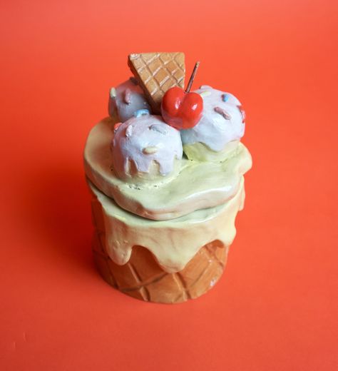 This unique ceramic ice cream shaped holder was handbuilt and sculpted by me, painted with underglaze and finished with a clear glaze. It can be used for whatever you want - candy, bobby pins, jewelry, small office supplies. Or you can simply use it as a fun decorative item.  I make my pieces at a pottery studio in Vancouver. Everything is slow-made with love and no two pieces are exactly the same. Ceramic Dessert, Clay Food Sculpture Ceramics, Food Ceramics, Clay Candy Bowl, Ceramic Jewelry Holder, Ice Cream Ceramic, Pottery Candy Dish, Pottery Ice Cream Bowl, Ice Cream Bowls Ceramic