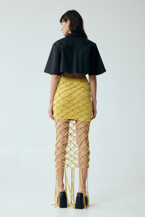 The Net Maxi Skirt embodies the quintessence of THIRD FORM - unique, timeless and high-quality. This is an artisanal THIRD FORM garment, with each piece being unique and knotted by hand. Embrace a unique texture into your wardrobe and reimagine your seasonal styling. Pair with the Net Ls Top for the complete look, or style with your favourite elevated basic to exude an effortless cool.