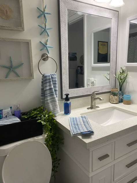 Beach Apartment Bathroom Ideas, Sea Bathroom Decor Ideas, Beach Apartment Bathroom, Guest Bathroom Beach Theme, Beach Restroom Decor Ideas, Seashore Bathroom Ideas, Sea Themed Bathroom Ideas, Small Bathroom Ocean Theme, Ocean Inspired Bathrooms