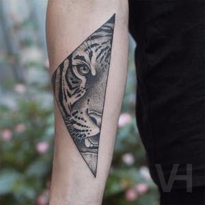 Tattoo uploaded by Tattoodo | Tiger paw by Luka Lajoie #LukaLajoie #realism #realistic #hyperrealism #color #tiger #fangs #junglecat #cat #tattoooftheday | 434189 | Tattoodo Finger Tattoos Words, Tiger Head Tattoo, Negative Space Tattoo, Love Yourself Tattoo, Tiger Tattoo Design, Tattoo Background, Bug Tattoo, Elements Tattoo, Shiva Tattoo Design