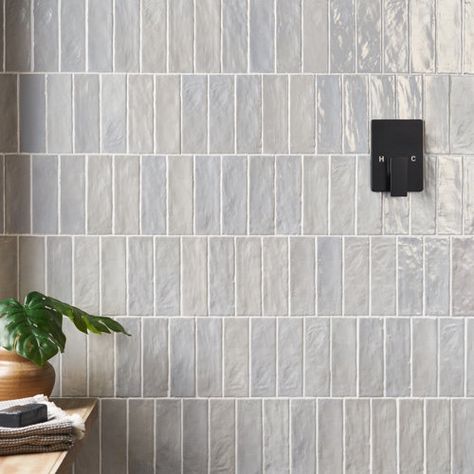 Backsplash Tile You'll Love | Wayfair Shower Cubby Accent Tile, Bathroom Tile Over Tub, Vertical Tile Kitchen Backsplash, Vertical Offset Subway Tile, Vertical Stacked Subway Tile Bathroom, Penny Tile Backsplash Kitchen, Vertical Bathroom Tile, Light Blue Bathroom Tile, Vertical Subway Tile Shower Ideas