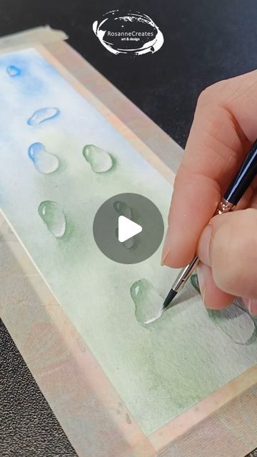 Watercolor tutorials and affordable art ❤️ on Instagram: "Trying out raindrops for the first time! How do you think I did? . . Paper: Baohong coldpressed Paints: Qor & Van Gogh Brushes: Silver Black Velvet . . #watercolorraindrops #raindropspainting #watercolorwaterdrops #waterdropspainting #droplet #dropletpainting #watercolorbookmark #bookmarkpainting #bookmarkart #simplewatercolor #simplewatercolorpainting #easywatercolors #watercolorfun #artvideo #watercolor #watercolorvideo #aquarela #waterverf #aquarelle #watercolortutorial" Watercolor Dropper Art, How To Paint Water Drops In Watercolor, Watercolor Water Droplets, How To Paint Water Drops, Dropadi Paintings, Watercolor Water Drops, Watercolor Bubbles Tutorials, Watercolor Music Art, How To Paint Rain Drops