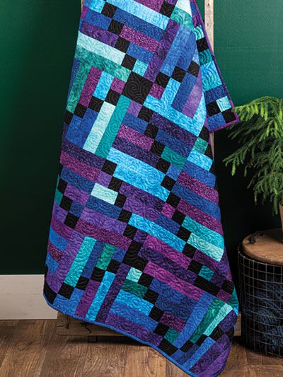 Gather your favorite jelly rolls and stitch up this easy and eye-catching quilt! Easy Quilts That Look Complicated, Hombre Quilt Pattern, Beautiful Quilts Patterns, Easy Free Quilt Patterns For Beginners, Mirror Mirror Quilt Pattern, Quilt Patterns Using Jelly Rolls, Strip Quilt Patterns Easy, Quilts For Teenage Boys, Jelly Roll Quilts Ideas