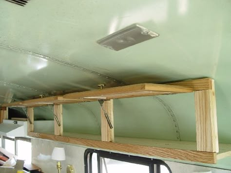 Bus Conversion Storage Ideas, Skoolie Upper Cabinet, Skoolie Cabinets Diy, Skoolie Shelves, Short Skoolie Interior, Diy Skoolie Conversion, Skoolie Storage Ideas, Skoolie Cabinets, Skoolie Framing