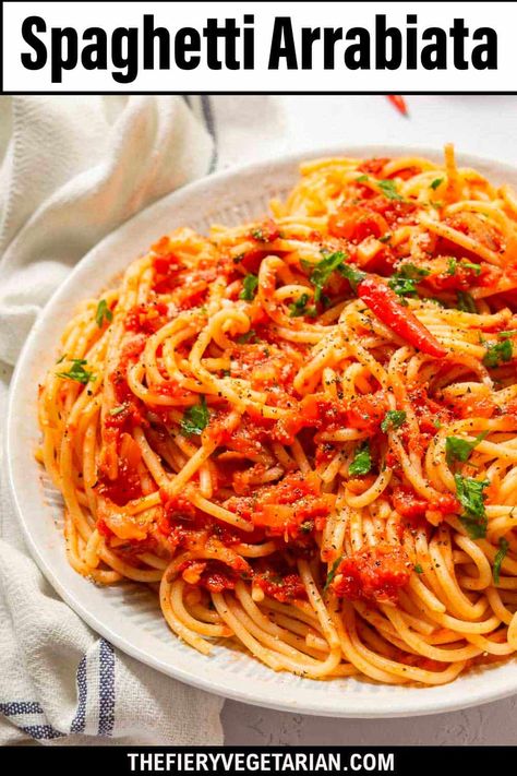 With just eight ingredients, this delicious simple spaghetti al arrabiata recipe cooks up in less than half an hour. Make it and let us know how much you loved it in the comments! Spaghetti Arrabiata Recipe, Spaghetti Arrabiata, Orthodox Fasting, Spaghetti Pasta Recipe, Pasta Arrabiata, Spicy Vegetarian Recipes, Spicy Vegan Recipes, One Pot Spaghetti, Fasting Recipes