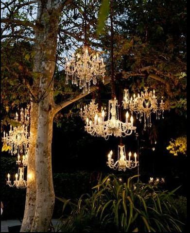 There’s nothing quite like a chandelier. Their romantic elegance and wide array of designs provide endless possibilities for home décor. As the summer winds dow Outdoor Evening, Wedding Chandelier, Outdoor Chandeliers, Outdoor Chandelier, Salou, Evening Wedding, Summer Dinner, Forest Wedding, Wedding Lights