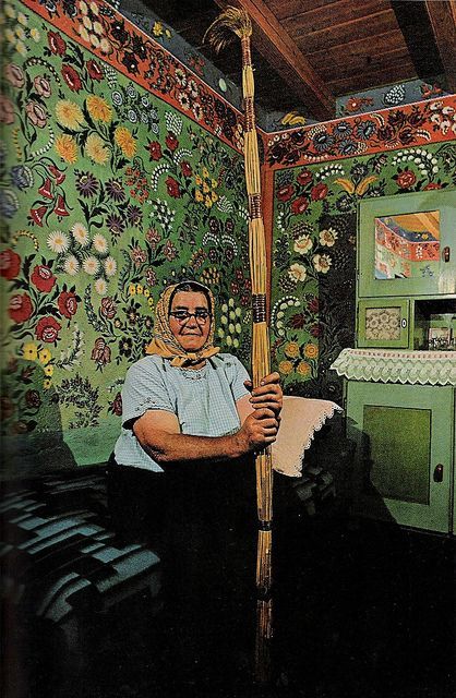 April 1971 "A whole house for a canvas: Mrs. Lajosne Vargacz sits before a bedroom mural painted with the help of her neighbors at Kalocsa. Such folk art, once common in the region, today has few practitioners. Cane-and-feather duster resembles the long-handled paint brushes the artists used to decorate hard-to-reach heights." Via Sara Gossett: Bedroom Mural, Arte Folk, Bedroom Murals, Folk Design, Baba Yaga, 2023 Trends, Art Brut, Naive Art, Arte Popular