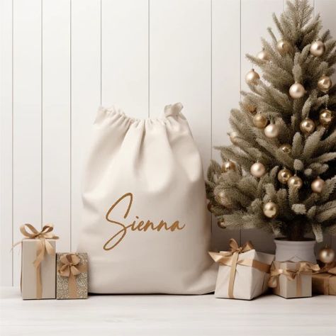 Personalised Linen Santa Sack 🎅✨ Forget wrapping paper—Santa’s got a stylish new sack! Ready to stuff it with festive magic? 🎁🎄 . . #PersonalisedSantaSack #SantaStyle #FestiveMagic #TimberTinkers #ChristmasSurprises #SantaSackUpgrade #HolidayCheer #FestiveSeason #GiftIdeas #ChristmasVibes #ChristmasGifts #HolidayMagic #CustomChristmas #PersonalisedGifts #SantaDelivers #ChristmasTraditions #HolidayJoy Pastel Christmas Decor, Classic Christmas Decorations, Canvas Wall Hanging, Santa Sack, Personalized Towels, Christmas Advent Calendar, Festive Design, Beautiful Decoration, Christmas Advent