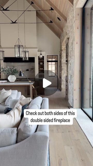 Check out this open double sided fireplace in the great room and library of our #threefallsproject! 🤍🤍🤍  Build @splitrockcustomhomes and @grovehomesutah Arch @stevetiek Two Sided Stone Fireplace, Two Sided Fireplace Living Room, Becki Owens Living Rooms, The Architect Nikki Sloane, Fireplace Next To Front Door, Entryway With Fireplace, Two Story Living Rooms, 4 Sided Fireplace, Double Fireplace Living Room