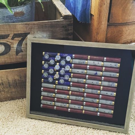 Shotgun Shell American Flag in a faux barnwood by TheRustyBirdCage Shotgun Shell Art, Shell Wreaths, Shotgun Shell Crafts, Bullet Casing Jewelry, Unique Flags, Gift Jar, Bullet Casing, Shotgun Shell, Shell Decor