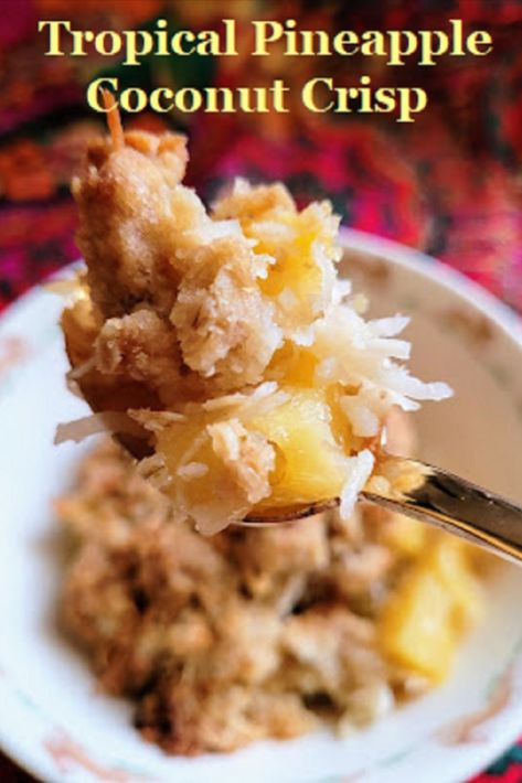 a heaping spoonful of crisp with chunks of pineapple and toasted coconut Pineapple Crisp Recipe, Pineapple Cherry Crisp, Rum Soaked Fried Pineapple With Coconut Crust, Tropical Bread, Easy Pineapple Cherry Crisp, Pineapple Oatmeal, App!e Crisp Recipe, Fruit Dumplings, Pineapple Crisp