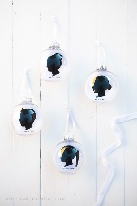 These simple, DIY, silhouette keepsake ornaments will help you capture a moment in time as you display your children's profiles year after year on your Christmas tree. Twin Crafts, Diy Silhouette, Silhouette Ornaments, Preschool Christmas Crafts, Simple Tree, Silhouette Diy, Children Party, Memory Tree, Silhouette Christmas