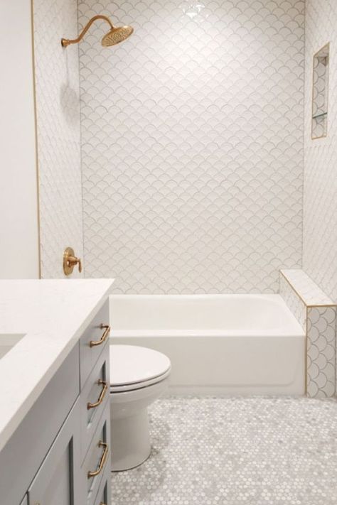 A simple neutral bathroom design Simple Neutral Bathroom, Neutral Bathroom Design, Fish Scale Tile Bathroom, White Fish Scale Tile, Neutral Bathrooms Designs, Penny Tiles, Ideas For Bathrooms, Vintage Clawfoot Tub, Scale Tile