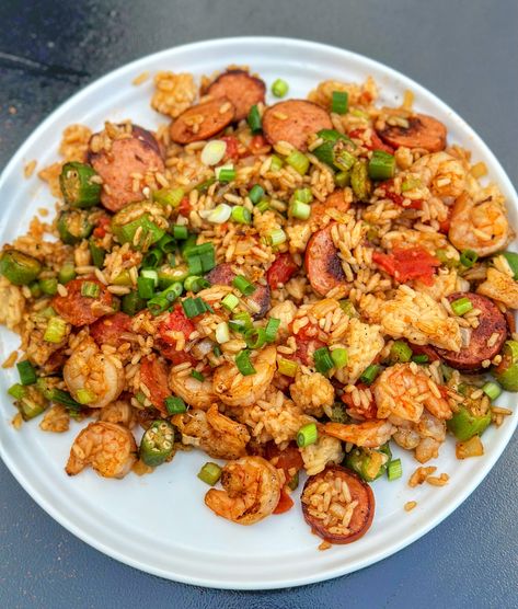 Shortcut ingredients come together quickly on the Traeger flattop grill to create this tasty jambalaya that your family will love for dinner. Blackstone Jambalaya, Traeger Flatrock Recipes, Sausage Stir Fry, Blackstone Recipes, Flat Top Grill, Griddle Recipes, Jambalaya Recipe, Traeger Recipes, Seafood Seasoning