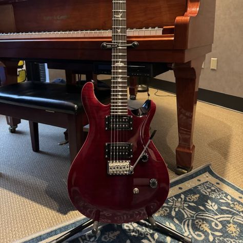 This long awaited guitar has arrived.  The black cherry finish on this instrument is truly beautiful!  Paul Reed Smith describes this guitar as:The... Bisexual Wallpaper Iphone Aesthetic, Electro Guitar, Violin Design, Black Electric Guitar, Black Guitar, Electric Guitar Design, Beautiful Butterfly Photography, Guitar Obsession, Prs Guitar