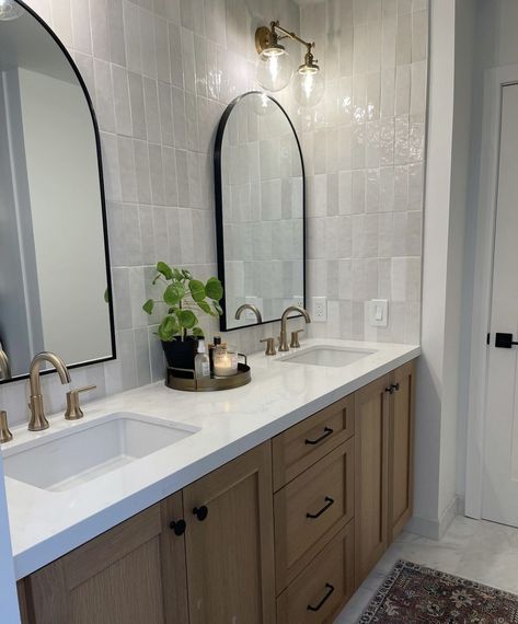 Jack And Jill Guest Bathroom Ideas, Modern European Farmhouse Bathroom, Bathroom Remodel Black Fixtures, Bathroom Tile Wall Behind Vanity, Grey Floors Bathroom, Galley Bathroom Layout, Gold Hardware Black Faucet, Timeless Farmhouse Bathroom, Mixing Black And Gold Hardware Bathroom