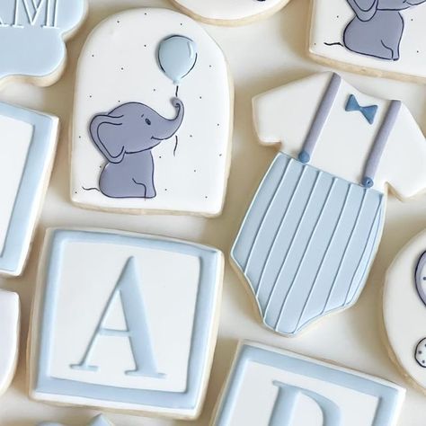 Taylor Schulteis on Instagram: "Perfect cookies for a baby boy shower! 🥰• • • • • #cookies #cookiedecorating #instacookies #instacookie #cookiesofinstagram #sweets #bakery #cookiesofig #sugarcookies #sweetone #buttercream #royalicingcookies #royalicing #cakesofinstagram #bakemyday #wilton #lemoncookies #orangecookie #onesie #onesies #lemon #onesiecookie #babyshowers #babyshower #lemonbabyshower #babyshowerparty #babyshowercookies #genderneutral #babygirl  #babyboy" Baby Sugar Cookies Decorated, Baby Boy Cookies Decorated, Baby Shower Boy Cookies, Baby Boy Sugar Cookies, Baby Shower Cookies For Boy, Baby Boy Shower Cookies, Boy Baby Shower Cookies, Baby Boy Cookies, Cookies Design