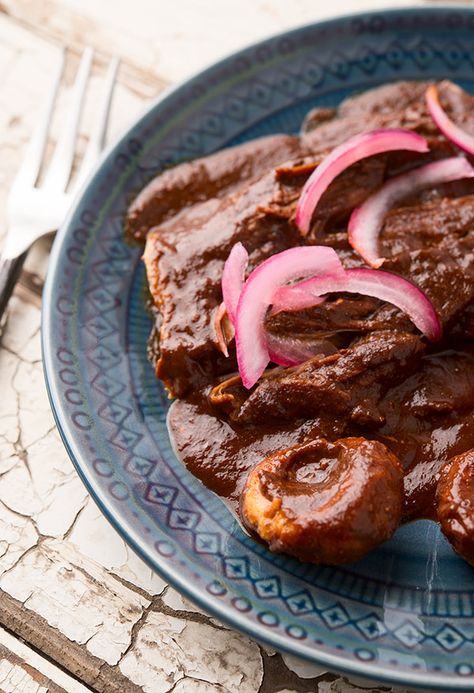 Venison mole chichilo, served with masa dumplings call chochoyotes. From Hunter Angler Gardener Cook. Venison Mexican Recipes, Mole Food, Recipes With Mole Sauce, Roast Venison Recipes, Authentic Mexican Mole Recipe, Mexican Food Recipes Mole, Deer Roast, Mexican Mole, Mole Recipe