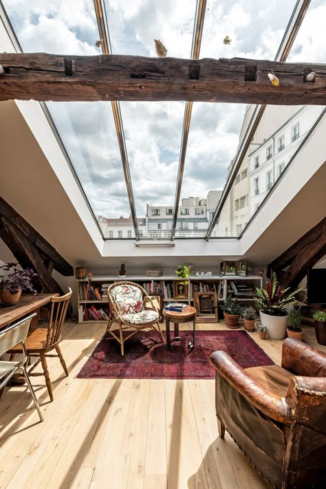 The Nordroom - Attic Apartment in Paris with Huge Skylight and Exposed Beams #paris #parishome #skylight Loft In Paris, Attic Apartment Aesthetic, Attic With Big Window, Home Office Skylight, Cozy Attic Apartment, Paris Loft Apartment, Attic Plant Room, Attic Appartement, Pitched Roof Apartment