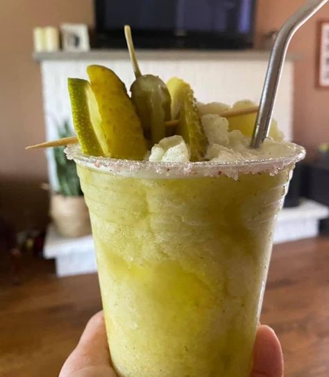 Pickle Tequila Slushy on this Patriotic Weekend. 🇺🇸 Tequila, dill pickle juice, pepperoncini juice, and a whole dill pickle. Blend all together with about 10-12 ice cubes. Garnish with a pickle & pepperoncini pepper. "You bring the tequila and I’ll bring the bad decisions." Blend and serve. 🫠 Pickle Pepperoncini, Dill Pickle Juice, Pickle Vodka, Chipotle Ranch, Slushie Recipe, Big Dill, Vodka Cocktails Recipes, Dill Pickles, Starbucks Drinks Recipes