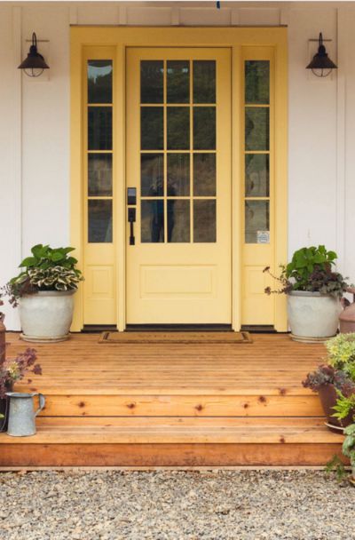 31 Houses With Yellow Front Entry Door Ideas - | Sebring Design Build Classic Door Design, Yellow Front Door, Farmhouse Paint Colors Interior, Front Porch Design Ideas, Yellow Front Doors, Farmhouse Entry, Porch Design Ideas, Front Door Paint Colors, Yellow Door