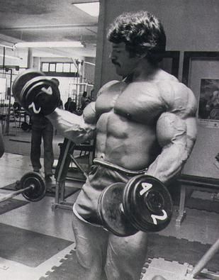 Mike Mentzer won the IFBB Mr. America title in 1976 Old School Bodybuilding Golden Age, Golden Age Bodybuilding, Mike Mentzer Bodybuilding, Mike Mentzer, Arnold Schwarzenegger Bodybuilding, Schwarzenegger Bodybuilding, Dumbbell Curls, Bodybuilding Pictures, Gym Guys