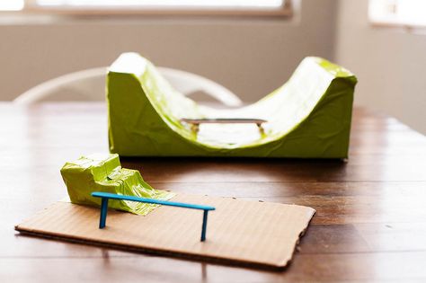 I think my boys like making/constructing things more than actually playing with them. This DIY cardboard skateboard park is a fun project to make up as you go plus you can play with it after as a bonus! We trimmed out a half pipe shape in a small(ish) box much like the car jump from Frugal … Diy Skateboard Ramps Cardboard, Cardboard Skateboard, Tech Deck Ramps Diy, Skateboard Birthday Party, Mini Skate, Skateboard Party, Skateboard Birthday, Mini Skateboard, Skateboard Ramps