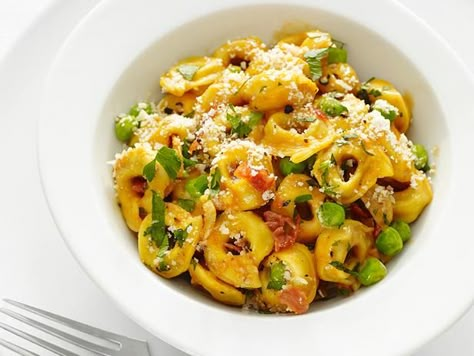 Get Tortellini with Peas and Prosciutto Recipe from Food Network Tortellini With Peas, Peas And Prosciutto, Prosciutto Recipe, Prosciutto Recipes, Tortellini Recipes, Italian Recipes Traditional, Food Network Magazine, Italian Dinner, Spaghetti Squash