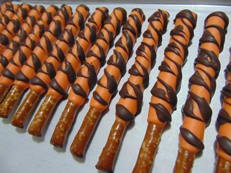 Chocolate covered Pretzel Rods "Tiger Tails" To see more visit MG's on www.etsy.com/shop/MarieGrahams Tiger Tails Pretzels, Bengals Superbowl, Bengals Party, Clemson Tailgating, Garfield Birthday, Daniel Tiger Party, Daniel Tiger Birthday Party, Tiger Birthday Party, Tiger Tails