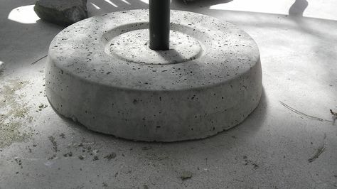 The umbrella stand in all its glory   It occurs to me, as I'm writing this update, that I really should have taken a photo of the actua... Diy Concrete Umbrella Base, Diy Umbrella Base, Diy Umbrella, Diy Concrete Patio, Outdoor Umbrella Stand, Offset Patio Umbrella, Patio Umbrella Stand, Large Umbrella, Offset Umbrella