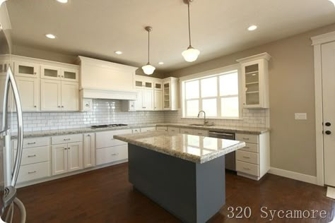 320 Sycamore's kitchen:  White dove cabs, revere pewter walls, giallo ornamental granite. Revere Pewter Walls, Revere Pewter Kitchen, Pewter Kitchen, Giallo Ornamental Granite, Pewter Paint, Glass Cabinets, Dove White, Home Building Tips, Wall White