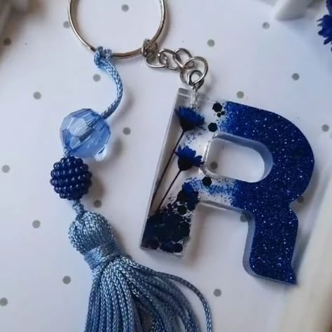 Beautiful 😍 resin keyring only for ₹100🤩 (Minimum order quantity- 4).......... ☆FREE SHIPPING☆ For single keyring you have to pay shipping Resin Keychain Ideas Alphabet, Resin Alphabet Keychain, Diy Resin Keychain, Hand Jewelry Rings, Resin Crafts Tutorial, Diy Resin Projects, Resin Jewelry Diy, Acrylic Keychains, Resin Keychain