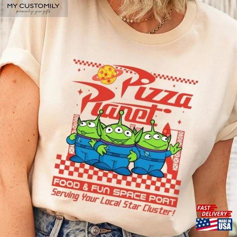 Pizza Planet Aliens Toy Story Buzz Lightyear T-Shirt Hoodie Check more at https://mycustomily.com/product/pizza-planet-aliens-toy-story-buzz-lightyear-t-shirt-hoodie/ Planet Pizza Toy Story, Buzz Lightyear Birthday Tshirt, Buzz Lightyear Shirt, Womens Buzz Lightyear Shirt, Toy Story Shirts Adults, Pizza Planet Shirt Toy Story, Pizza Planet Shirt, Planet Shirt, Pizza Planet